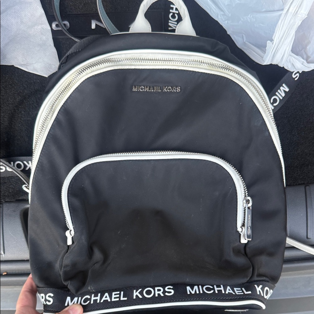 Michael Kors Sport Connie Medium Backpack in black nylon with white leather